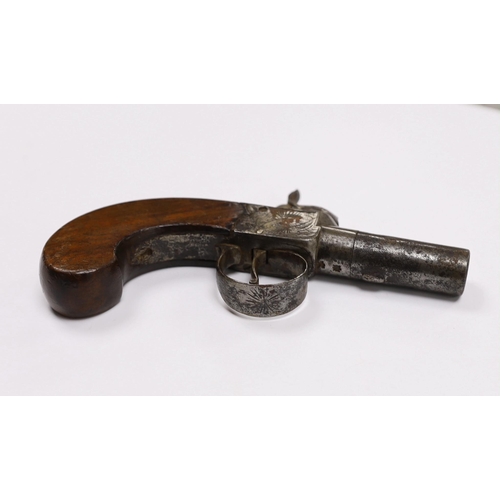 293 - A 19th century box lock percussion pocket pistol with turn off barrel, engraved frame slab and walnu... 