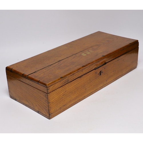 302 - An oak Colt pistol box, felt lined compartments containing a few tools including a bullet mould, lab... 