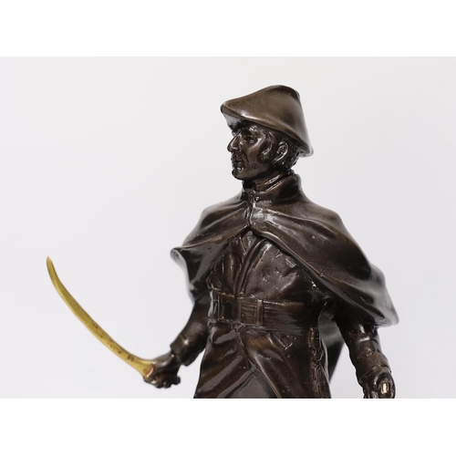 308 - A bronze figure of Wellington with brass sword blade and cannon, signed Boucher, mounted on a marb... 