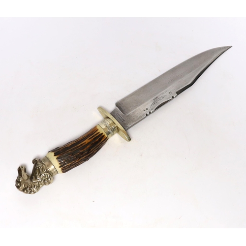 312 - A James & Lowe Bowie knife, clip point blade with unsharpened false edge and decorative filework, st... 