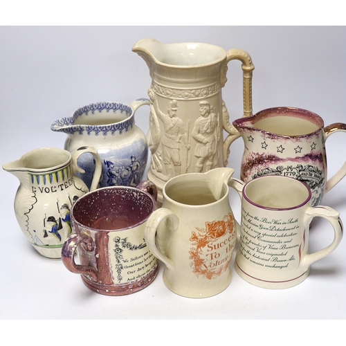 319 - Seven military and naval themed jugs including a Leeds creamware jug 'Loyal Volunteers' inscribed 'L... 