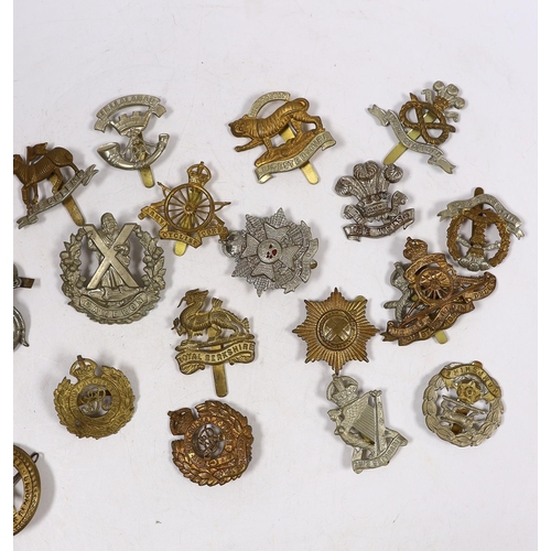 321 - Twenty-five military cap badges including Royal Engineers, The Kings Own, Royal Warwickshire, North ... 