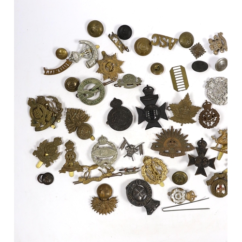 327 - Twenty-five military cap badges including Air Training Corps, Australian Commonwealth Military Force... 