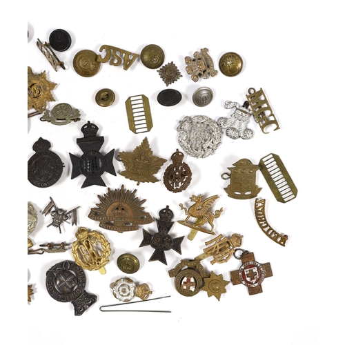 327 - Twenty-five military cap badges including Air Training Corps, Australian Commonwealth Military Force... 