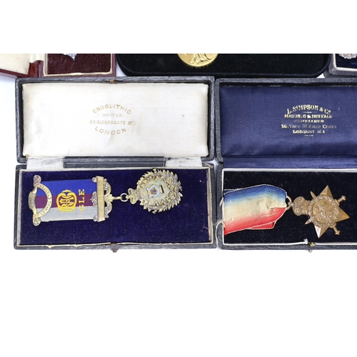 329 - WWI trio awarded to CMT - 735 PTE A E COX ASC, three cased silver Masonic medals, two with enamel to... 