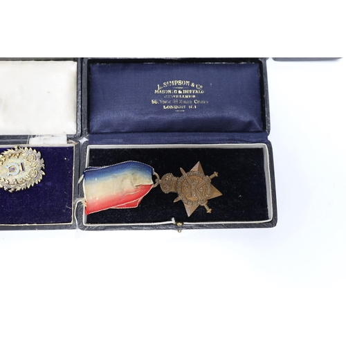 329 - WWI trio awarded to CMT - 735 PTE A E COX ASC, three cased silver Masonic medals, two with enamel to... 