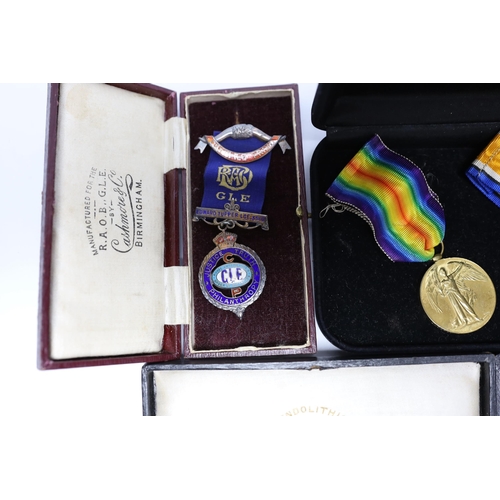 329 - WWI trio awarded to CMT - 735 PTE A E COX ASC, three cased silver Masonic medals, two with enamel to... 