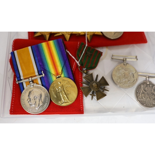 334 - Nine WWI / WWII medals; a pair of WWI medals, the War medal and Victory medal to J.R. Hemmings R.A.F... 