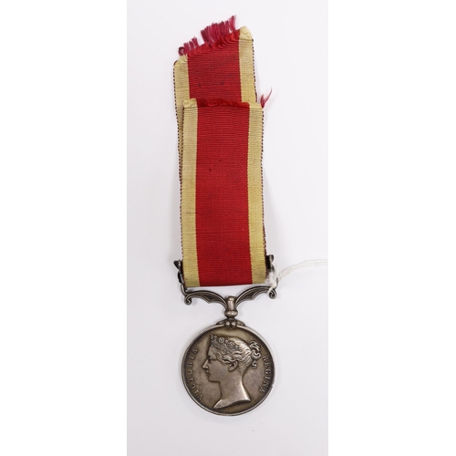 336 - An 1843 Victoria China War Medal, unnamed, with bar for Canton 1857