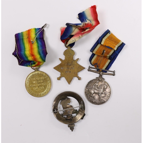 338 - A WWI medal trio to SJT. F.W. Killick R. Fus. and a cap badge