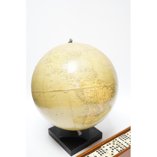 356 - A Philips 10" Challenge globe on stand and a cased set of dominoes, globe 32cm high