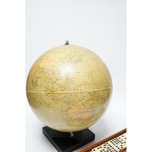 356 - A Philips 10" Challenge globe on stand and a cased set of dominoes, globe 32cm high