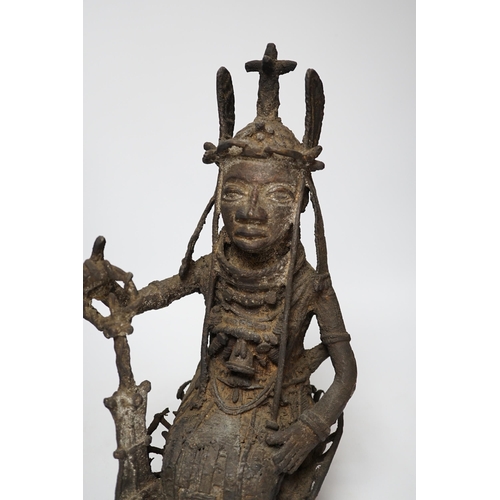 362 - A 19th century Benin bronze of a seated figure, 38cm high