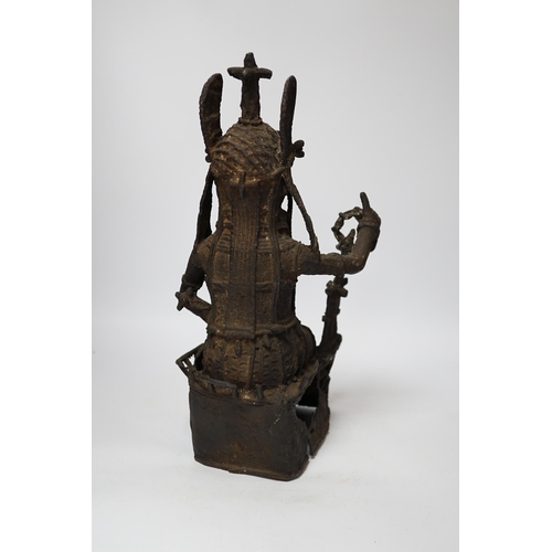 362 - A 19th century Benin bronze of a seated figure, 38cm high