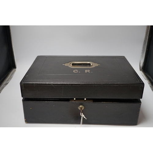 364 - A Houghton & Gunn black leather travel stationary box, 29cm wide x 29cm deep