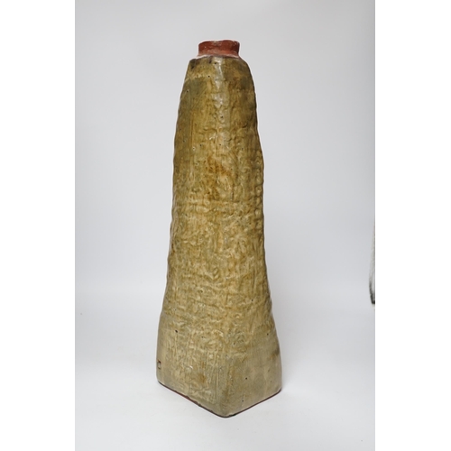 366 - A Troika type terracotta lamp stem, 47cm high