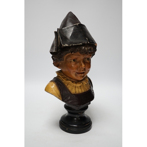 369 - A French cold painted terracotta bust of a child in a bicorn hat on socle plinth, 37cm high