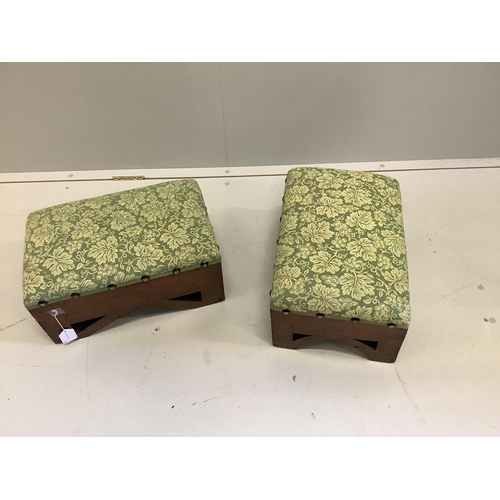 37 - A pair of rectangular Gothic style oak footstools, width 46cm, depth 30cm, height 23cm