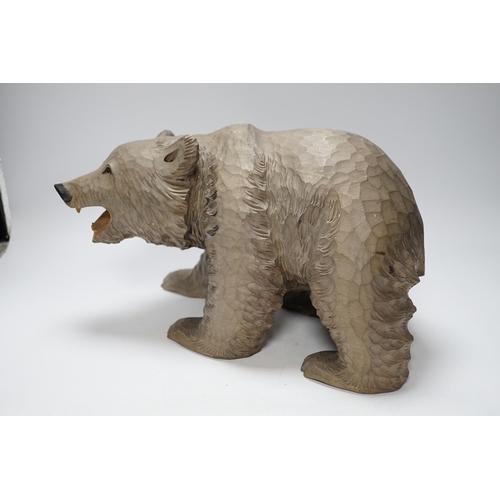 377 - A Japanese carved wood bear, 32cm long