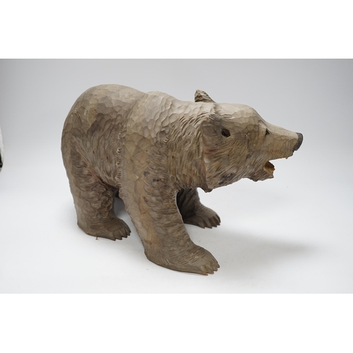 377 - A Japanese carved wood bear, 32cm long