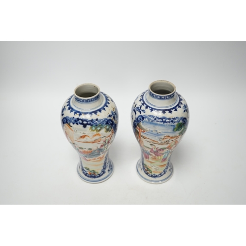 393 - A pair of late 18th century Chinese famille rose mandarin vases, 19cm high