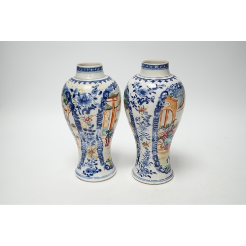 393 - A pair of late 18th century Chinese famille rose mandarin vases, 19cm high