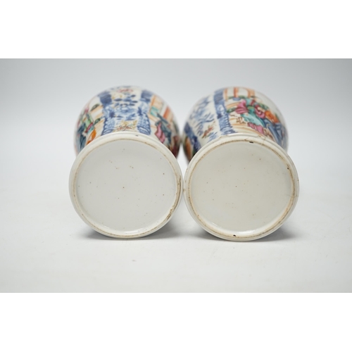 393 - A pair of late 18th century Chinese famille rose mandarin vases, 19cm high