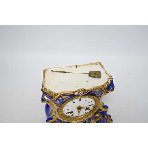 401 - An early 20th century French porcelain mantel clock, missing top section, 19cm