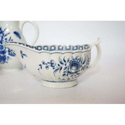 405 - A Worcester rose pattern sauceboat c.1770 and two three flowers pattern milk jugs, largest 18cm wide... 