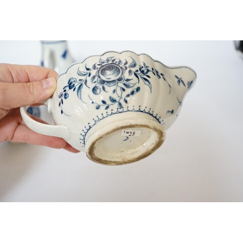 405 - A Worcester rose pattern sauceboat c.1770 and two three flowers pattern milk jugs, largest 18cm wide... 