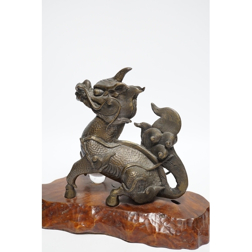 408 - A bronze study of a Kirin, probably Japanese, 22cm high