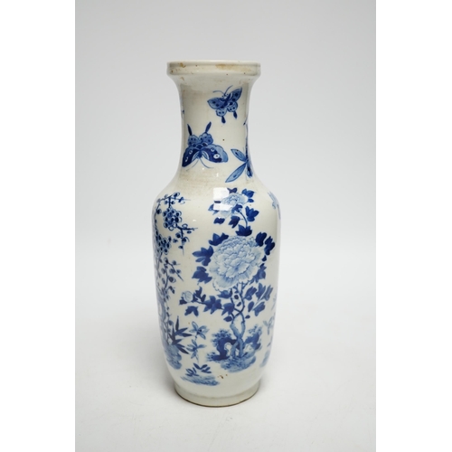 411 - A 19th century Chinese blue and white vase decorated with flowers and bugs, 25cm high