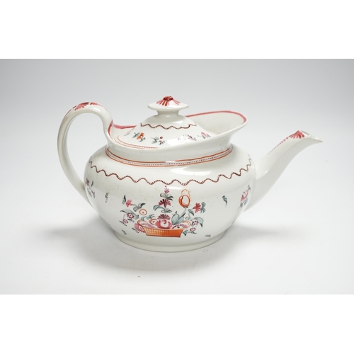 412 - A Newhall porcelain boat shaped teapot, c.1800 with floral decoration, 25cm wide