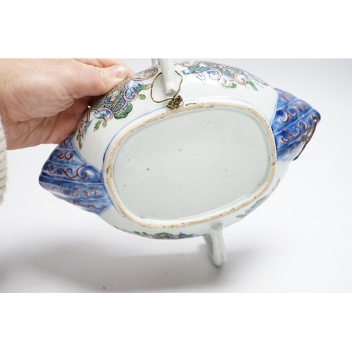 415 - A Chinese clobbered blue and white double lipped sauceboat, Qianlong period, 23cm high