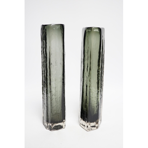 416 - A near pair of Whitefriars Cucumber vases in pewter, largest 30cm high