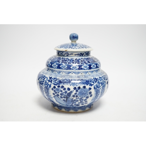 419 - A late 19th century Chinese blue and white floral jar and cover, seal mark, 17cm high