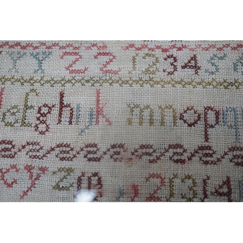 426 - Two Victorian alphabet samplers worked by Emma and Hannah Barnes, one dated 1853, framed as one, ove... 