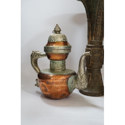 437 - A Chinese bronze gu vase, a 19th century Chinese blue and white vase and a Tibetan teapot, tallest 3... 