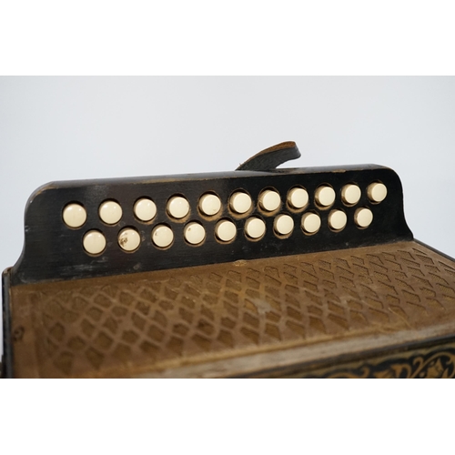 439 - A Hohner accordion with Bakelite buttons