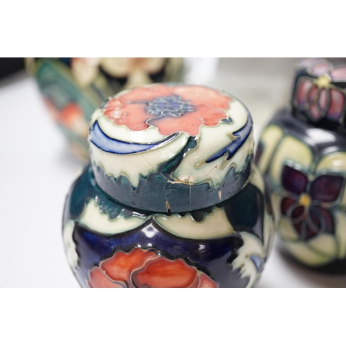 459 - Four modern Moorcroft jars and covers, largest 16cm high, three boxed and a Nao figure group, talles... 