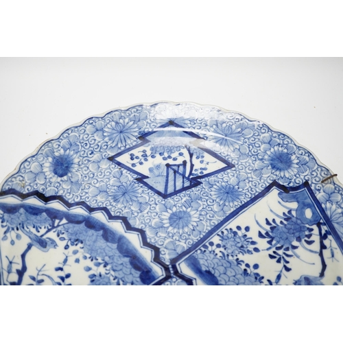 463 - A Japanese blue and white charger, early 20th century, 40cm diameter