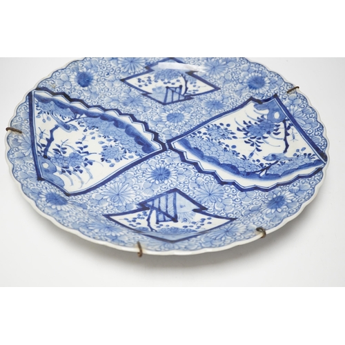 463 - A Japanese blue and white charger, early 20th century, 40cm diameter