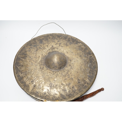 464 - An Indonesian silver plated gong and beater, gong 33cm diameter