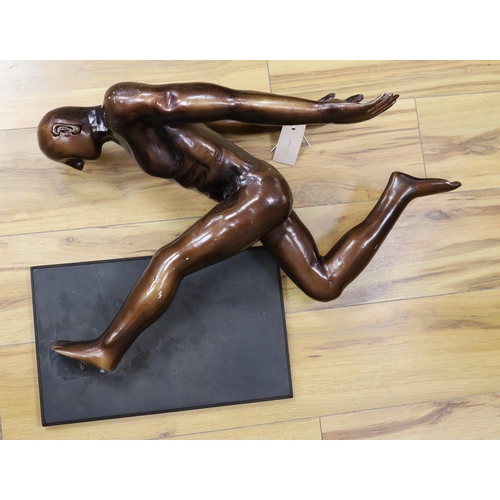 470 - A patinated spelter figure of an Olympian figure, 62 cm wide x 52cm high