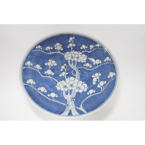 474 - A 19th century Chinese blue and white Prunus dish, 33cm diameter