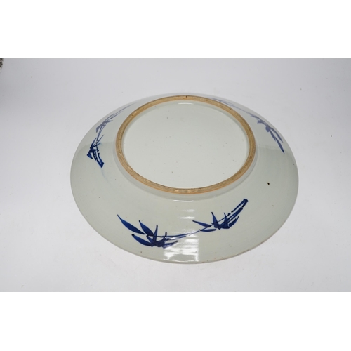 474 - A 19th century Chinese blue and white Prunus dish, 33cm diameter