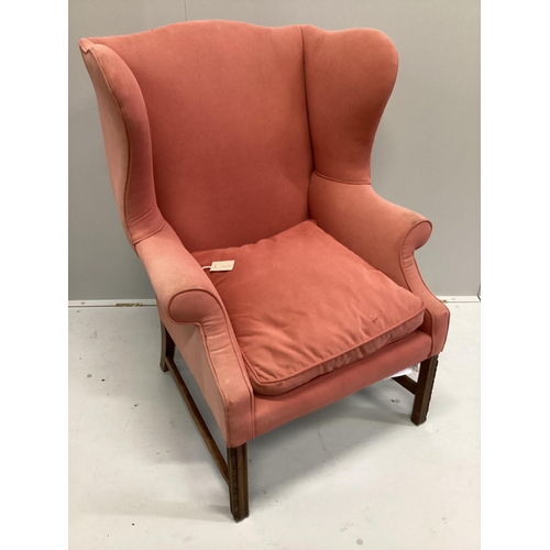 48 - A George III style upholstered wing armchair, width 80cm, depth 80cm, height 110cm