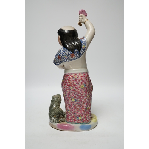 482 - A Chinese famille rose porcelain figure of Liu Hai, stamp to base, 39cm