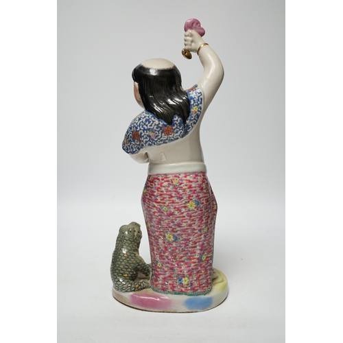 482 - A Chinese famille rose porcelain figure of Liu Hai, stamp to base, 39cm