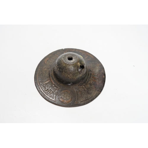 492 - An early Islamic bronze and copper inlaid shield boss, 14.5cm